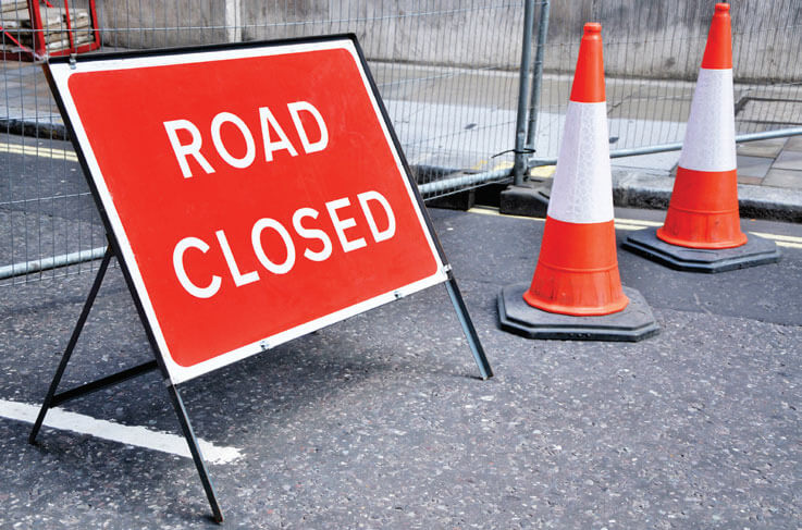 Fence and road closed barrier