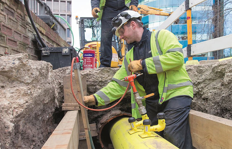 Two engineers working near the site