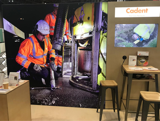 utility-week-stand.jpg Board of engineer repairing the connection pipe at the Utility week.