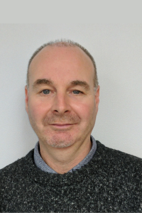 Portrait photo of Andy Brown, Chief Executive Officer of Citizens Advice Manchester