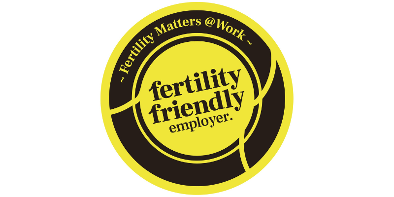 Fertility Matters at Work ‘Fertility Friendly Employer’ badge, shown as a yellow and black circular logo with overlapping ring shapes.