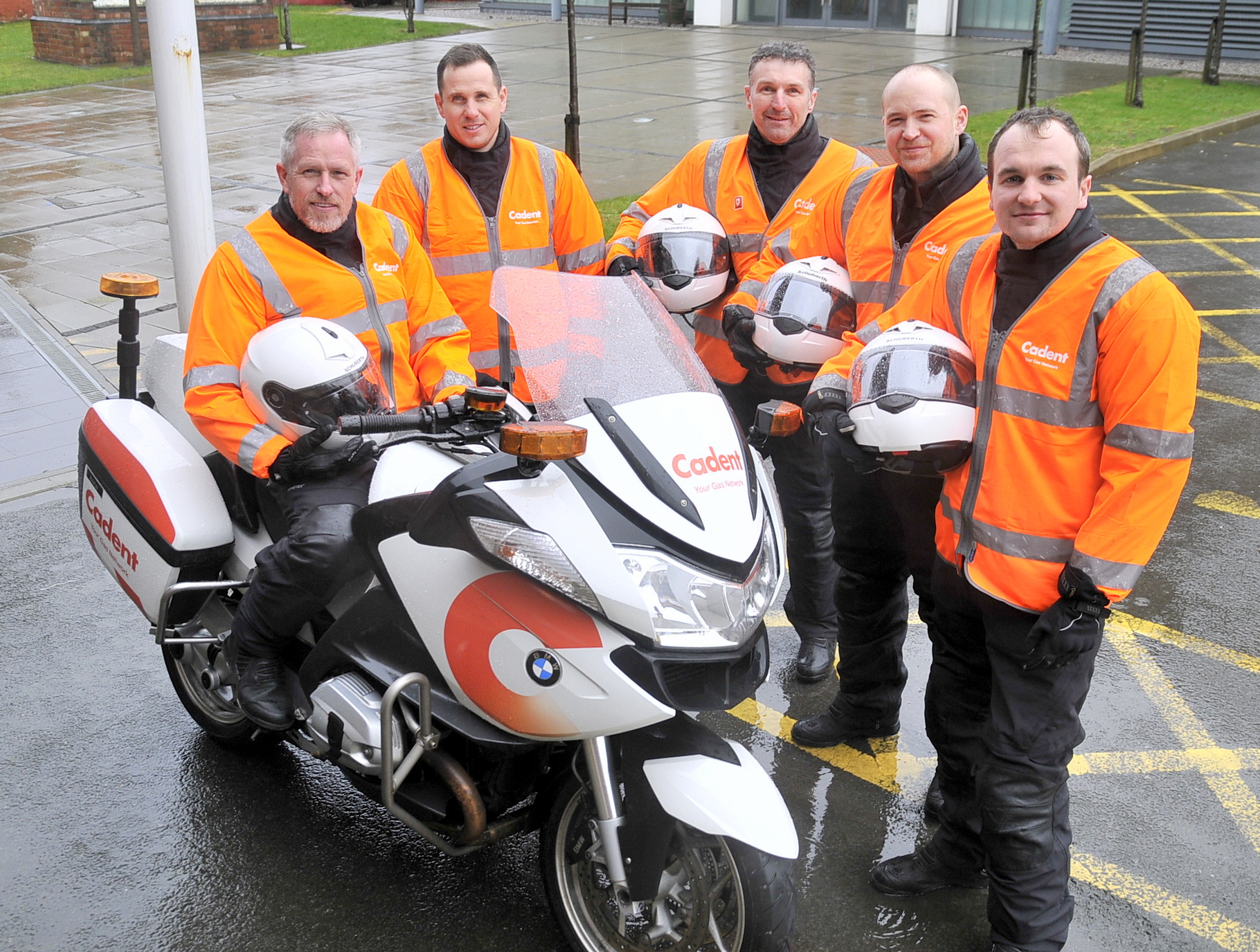 Cadent engineers with motorbike